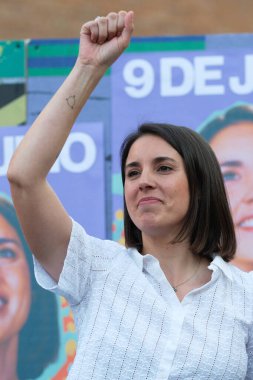 The candidate of Podemos for the European elections, Irene Montero,  during the beginning of the electoral campaign of Podemos, in the Arturo Barea square, on 23 May, 2024 in Madrid, Spain. clipart