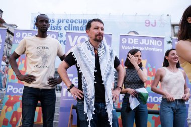 Pablo Iglesias during the end of the electoral campaign for the 9J European elections of Podemos, in Plaza Zerolo, on June 7 2024 in Madrid Spain clipart