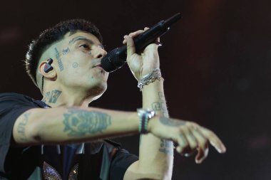 Argentine singer Duki during a performance at the Santiago Bernabeu Stadium, on June 8, 2024, in Madrid, Spain.  clipart