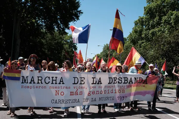 stock image People protest during a march against the monarchy, the end of King Felipe VI and the establishment of the Republic in Puerta de Sol  on June 16, 2024 in Madrid, Spain