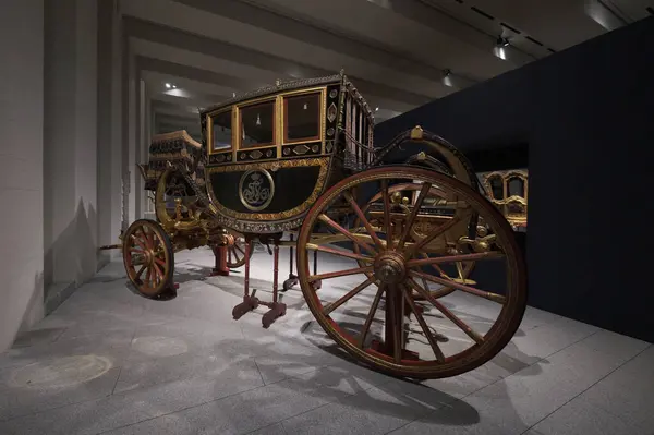 stock image View of the exhibition of In Motion. Vehicles and carriages of National Heritage in Gallery Of The Royal Collections museum on June 28, 2023 in Madrid, Spain