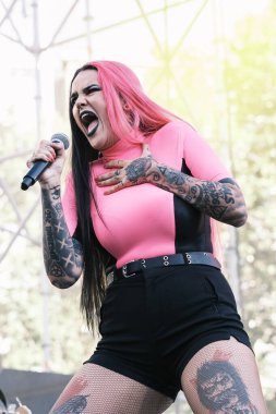 Kenzy Loevett from the group Megara performs during the concert of the Mado Pride festival in the Plaza de Espaa in Madrid, July 7, 2024 Spain clipart