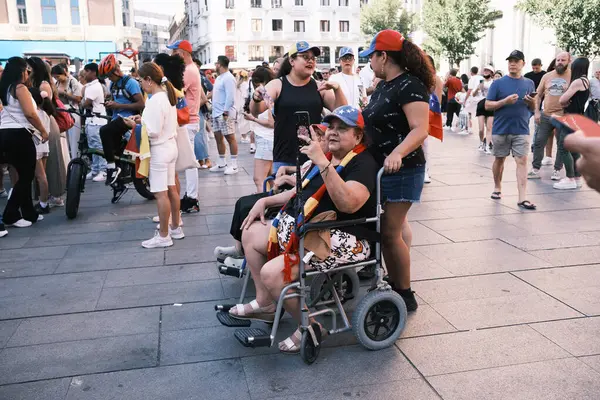 stock image Several people during the demonstration for the mobilization of hope to the caravan of freedom in the upcoming elections in Venezuela, at the Plaza de Espaa, on 21 July, 2024 in Madrid Spain