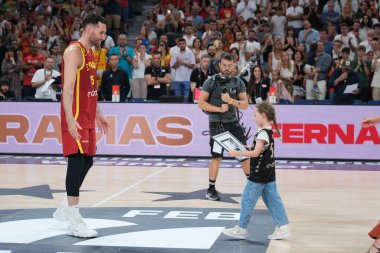 Rudy Fernandez and Helen Lindes during their tribute for being the last match with Spain after the match between Spain and Puerto Rico at the WiZink Center on July 23, 2024 in Madrid, Spain. clipart