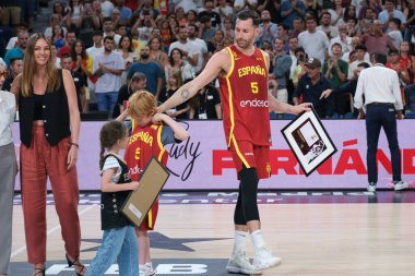 Rudy Fernandez and Helen Lindes during their tribute for being the last match with Spain after the match between Spain and Puerto Rico at the WiZink Center on July 23, 2024 in Madrid, Spain. clipart