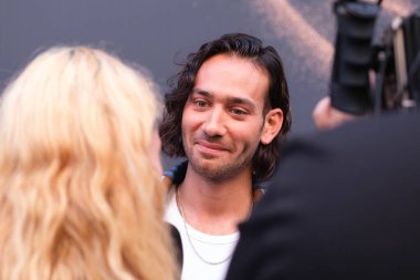 Ismael Cruz Cordova and Maxim Baldry attend 