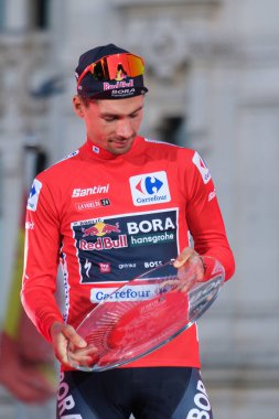 Primoz Roglic of Slovenia and Red Bull Bora Team celebrates his victory at the end of the 79th Vuelta a Espaa 2024 on September 8, 2024 in Madrid Spain clipart