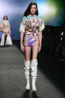 A model walks the runway wearing a design by CUSTO BARCELONA during Mercedes-Benz Fashion Week de Madrid in IFERMA, September 14, 2024 Spain clipart