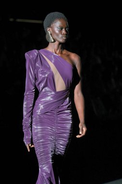 A model walks the runway wearing a design by Michael Costello  during Mercedes-Benz Fashion Week de Madrid in IFERMA, September 14, 2024 Spain clipart