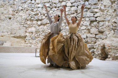 Dancers from the Chilean company Florencia Hoz perform during the performance of Antpodas in the archaeological remains room of the Royal Palace in Madrid, October 4 2024 Spain clipart