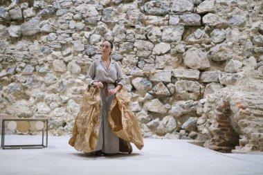 Dancers from the Chilean company Florencia Hoz perform during the performance of Antpodas in the archaeological remains room of the Royal Palace in Madrid, October 4 2024 Spain clipart