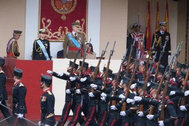 İspanya Veliaht Prensesi Leonor, İspanya Kralı VI. Felipe ve İspanya Kraliçesi Letizia 12 Ekim 2024 tarihinde İspanya 'nın Madrid kentinde düzenlenen Ulusal Gün Askeri Yürüyüşüne katıldılar.