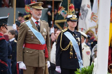 Crown Princess Leonor of Spain and  King Felipe VI of Spain attend the National Day Military Parade on October 12, 2024 in Madrid, Spain clipart