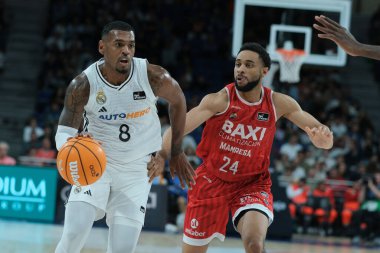 Real Madrid 'den Xavier Rathan, Real Madrid ile Basquet Manresa arasındaki ACB Liga Endesa Basketbol maçı sırasında 27 Ekim 2024 tarihinde İspanya' da WiZink Center 'da oynanmıştır.