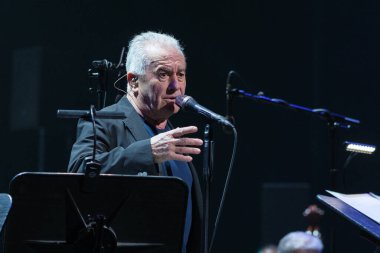 The singer-songwriter Victor Manuel during his final concert of his symphonic tour, at the Teatro Real, on November 16, 2024, in Madrid, Spain. clipart