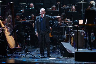 The singer-songwriter Victor Manuel during his final concert of his symphonic tour, at the Teatro Real, on November 16, 2024, in Madrid, Spain. clipart