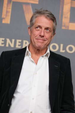 İngiliz aktör Hugh Grant 21 Kasım 2024 tarihinde İspanya 'nın Madrid kentinde Kiniopolis sinemasında kafirlerin galası için yapılan fotoçağrıya katıldı.