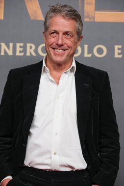 İngiliz aktör Hugh Grant 21 Kasım 2024 tarihinde İspanya 'nın Madrid kentinde Kiniopolis sinemasında kafirlerin galası için yapılan fotoçağrıya katıldı.