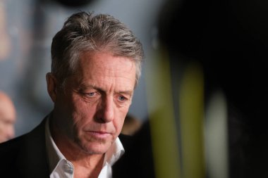 İngiliz aktör Hugh Grant 21 Kasım 2024 tarihinde İspanya 'nın Madrid kentinde Kiniopolis sinemasında kafirlerin galası için yapılan fotoçağrıya katıldı.