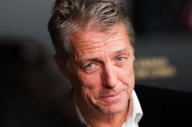 British actor Hugh Grant attends the photocall for the premiere of the film Heretic at the Kiniopolis cinema in Madrid, 21 November 2024 Spain clipart