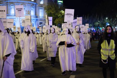 people during the demonstration  Against Violence against Women on the occasion of 25N and under the slogan Combat sexism in  Plaza de Espaa, on 25 November 2024 in Madrid Spain clipart