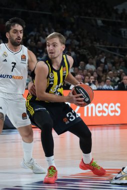 Fenerbahçe 'den Arturs Zagars (İstanbul), Real Madrid ile Fenerbahçe Beko İstanbul arasında oynanan Türk Hava Yolları Düzenli Sezonu 14. Raundda oynanan karşılaşmada, 05 Aralık 2024 tarihinde İspanya' nın Madrid kentinde oynanan WiZinkCenter maçında İstanbul 'da görülüyor.
