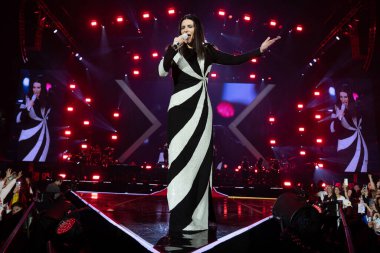 Italian singer Laura Pausini performs during her concert in Madrid, December 7, 2024 Spain clipart