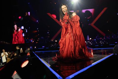 Italian singer Laura Pausini performs during her concert in Madrid, December 7, 2024 Spain clipart