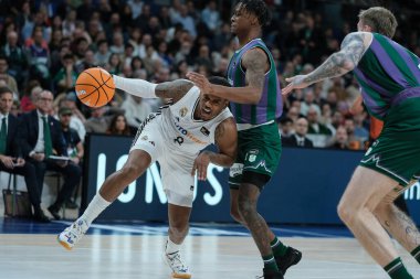 Xavier Rathan  player of Real Madrid at WiZink Center during the Real Madrid v Unicaja -Liga Endesa match on  08 December  2024 in Madrid Spain clipart