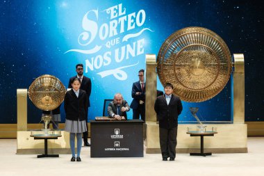 The children of San Ildefonso sing the lottery balls with the numbers of the Extraordinary Draw of the Christmas Lottery, called 'El Gordo', at the Teatro Real on December 22, 2024 in Madrid, Spain. clipart