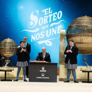 The children of San Ildefonso sing the lottery balls with the numbers of the Extraordinary Draw of the Christmas Lottery, called 'El Gordo', at the Teatro Real on December 22, 2024 in Madrid, Spain. clipart