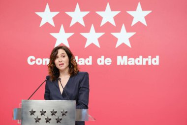 Madrid Topluluğu Başkanı Isabel Diaz Ayuso, yönetim konseyinin 26 Aralık 2024 tarihinde İspanya 'nın Madrid şehrinde bulunan Real Casa de Correos' ta bir basın toplantısı düzenledi.
