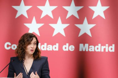 Madrid Topluluğu Başkanı Isabel Diaz Ayuso, yönetim konseyinin 26 Aralık 2024 tarihinde İspanya 'nın Madrid şehrinde bulunan Real Casa de Correos' ta bir basın toplantısı düzenledi.