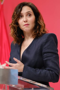 The president of the Community of Madrid, Isabel Diaz Ayuso, gives a press conference after the meeting of the Governing Council, at the Real Casa de Correos, on 26 December, 2024 in Madrid, Spain clipart