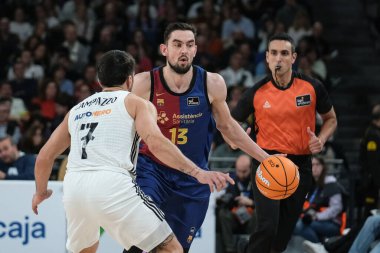 Liga ACB basketbol maçı sırasında Baca 'dan Tomas Satoransky Real Madrid ve Barca en Wizcenter 29 Aralık 2024 tarihinde İspanya' nın Madrid kentinde oynanmıştır.