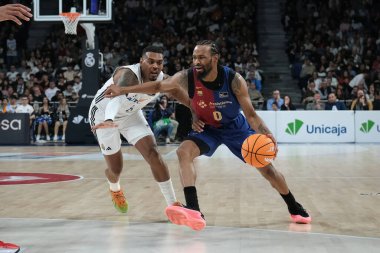 Liga ACB basketbol maçı sırasında Baca 'lı Kevin Punter Real Madrid ve Barca en Wizcenter 29 Aralık 2024 tarihinde İspanya' nın Madrid kentinde oynanmıştır.