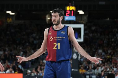 Liga ACB basketbol maçı sırasında Baca 'lı Alex Abrines Real Madrid ve Barca en Wizcenter 29 Aralık 2024 tarihinde İspanya' nın Madrid kentinde oynanmıştır.