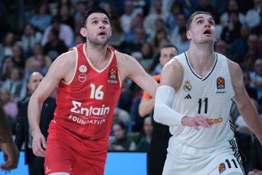 Olympiacos Pire 'den Kostas Papanthe 16 Ocak 2025 tarihinde İspanya' nın Movistar Arena kentinde oynanan Türk Hava Yolları EuroLeague karşılaşmasında Real Madrid ile Olympiacos arasında oynanan karşılaşmada