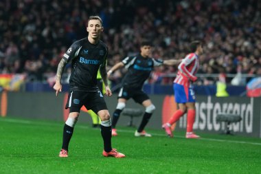  21 Ocak 2025 tarihinde İspanya 'nın Madrid kenti Bayer Leverkusen ile Atletico Madrid arasında oynanan UEFA Şampiyonlar Ligi 7. hafta futbol maçında Bayer Leverkusen' in formasını giymiştir.