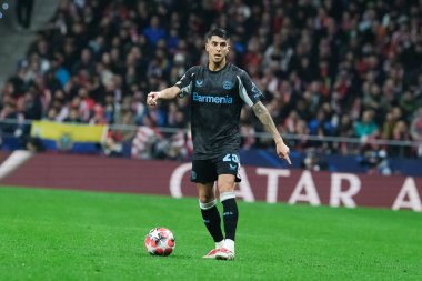  21 Ocak 2025 tarihinde İspanya 'nın Madrid kenti Bayer Leverkusen ile Atletico Madrid arasında oynanan UEFA Şampiyonlar Ligi 7. hafta futbol maçında Bayer Leverkusen' in formasını giymiştir.