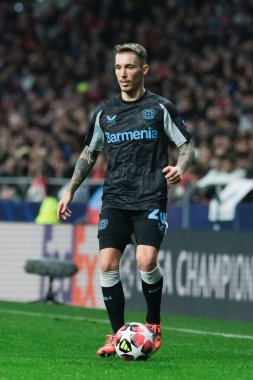  21 Ocak 2025 tarihinde İspanya 'nın Madrid kenti Bayer Leverkusen ile Atletico Madrid arasında oynanan UEFA Şampiyonlar Ligi 7. hafta futbol maçında Bayer Leverkusen' in formasını giymiştir.