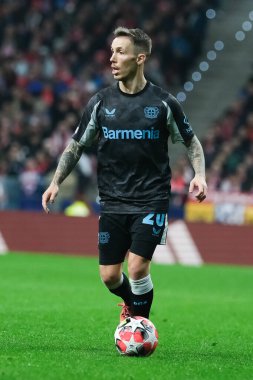  21 Ocak 2025 tarihinde İspanya 'nın Madrid kenti Bayer Leverkusen ile Atletico Madrid arasında oynanan UEFA Şampiyonlar Ligi 7. hafta futbol maçında Bayer Leverkusen' in formasını giymiştir.