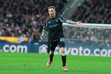  21 Ocak 2025 tarihinde İspanya 'nın Madrid kenti Bayer Leverkusen ile Atletico Madrid arasında oynanan UEFA Şampiyonlar Ligi 7. hafta futbol maçında Bayer Leverkusen' in formasını giymiştir.