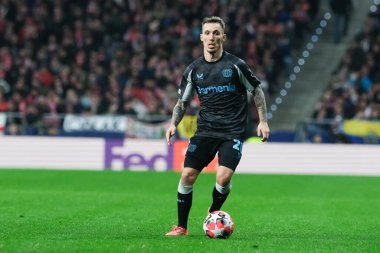  21 Ocak 2025 tarihinde İspanya 'nın Madrid kenti Bayer Leverkusen ile Atletico Madrid arasında oynanan UEFA Şampiyonlar Ligi 7. hafta futbol maçında Bayer Leverkusen' in formasını giymiştir.