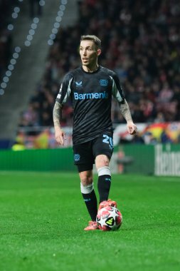  21 Ocak 2025 tarihinde İspanya 'nın Madrid kenti Bayer Leverkusen ile Atletico Madrid arasında oynanan UEFA Şampiyonlar Ligi 7. hafta futbol maçında Bayer Leverkusen' in formasını giymiştir.