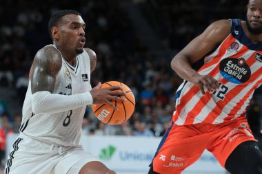 Real Madrid 'den Xavier Rathan, Real Madrid ile Coruna arasındaki maç sırasında 25 Ocak 2025 tarihinde İspanya' nın başkenti Madrid 'de WiZink Center' da oynanmıştır..