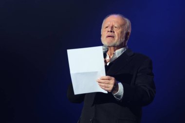 Actor Juan Echanove speaks during the tribute concert to Pablo Milanes, 'Eternamente Pablo', at the Movistar Arena, on 12 February, 2025 in Madrid, Spain. clipart