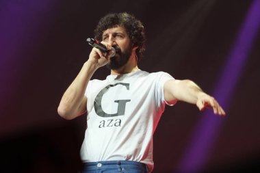 Singer-songwriter Marwan performs during the tribute concert to Pablo Milanes, 'Eternamente Pablo', at the Movistar Arena, on 12 February, 2025 in Madrid, Spain. clipart