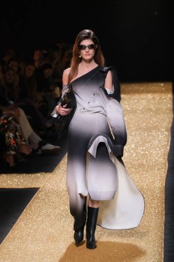 A model walks the runway wearing a design by Isabel Sanchis during Mercedes-Benz Fashion Week de Madrid in IFERMA, 21 February  2025 Spain clipart