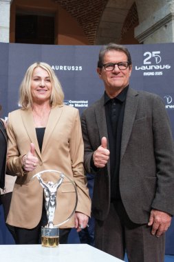 Laureus World Sports Academy üyesi Nadia Comaneci, 2003 Mart 2025 tarihinde İspanya 'da Real Casa de Correos' ta Laureus Spor Ödülleri için yapılan açıklamaya katıldı.